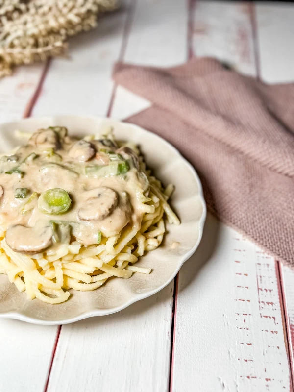 Spätzle mit Lauch-Champignon-Soße